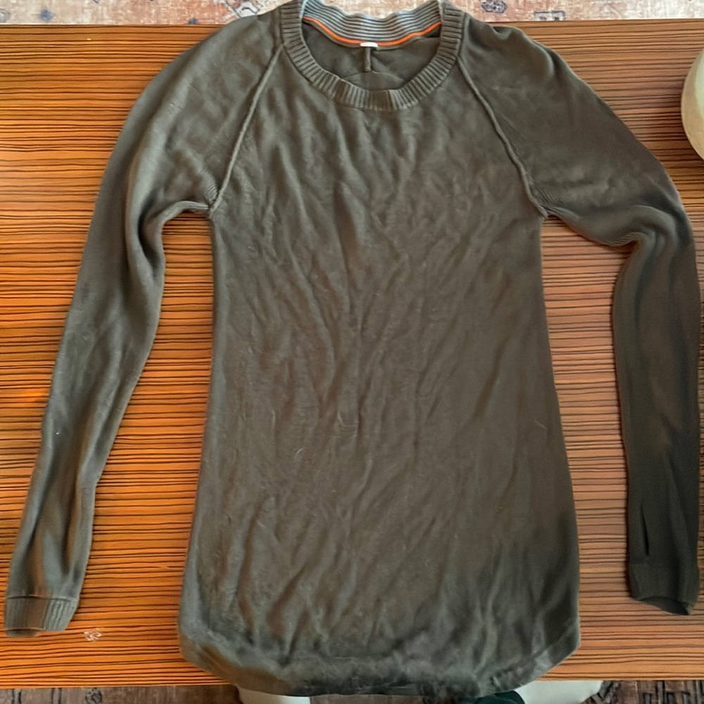 Lululemon sweater. Cashmere. Right fit. Curved hem at the bottom.